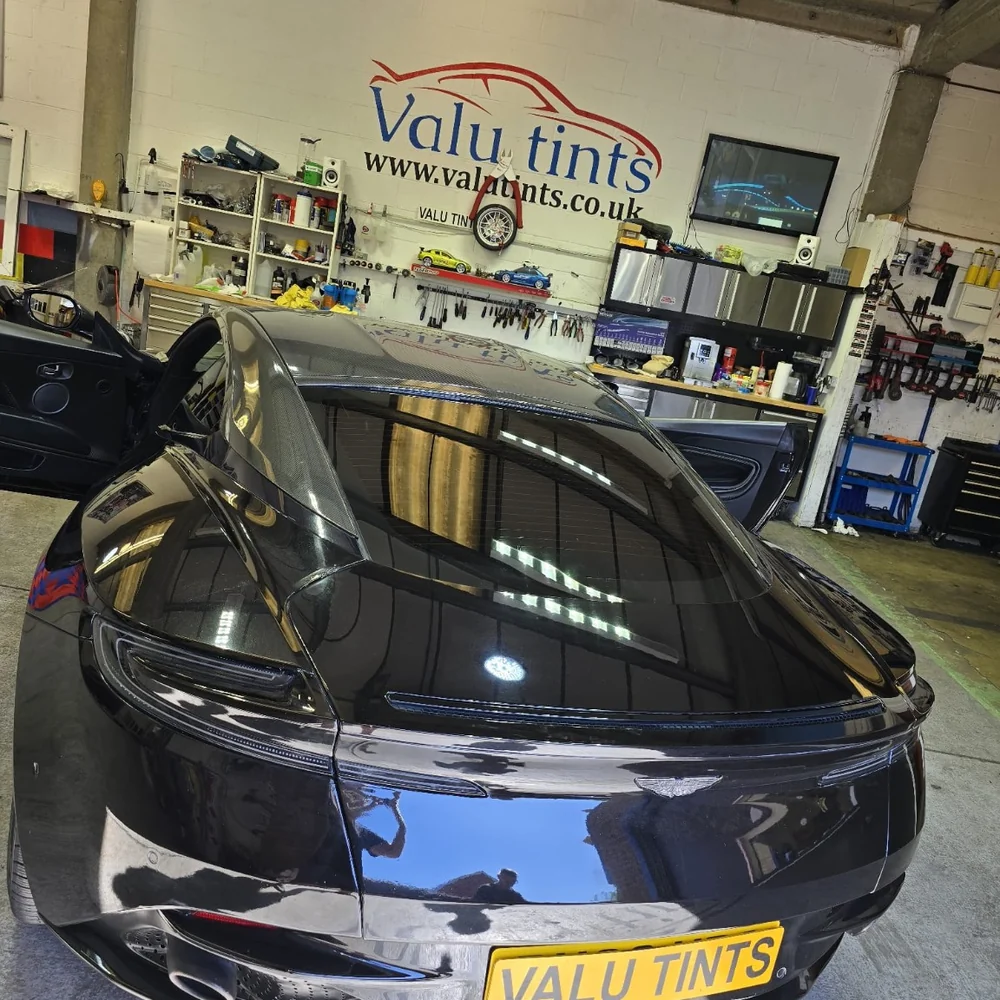 Dark Aston Martin finished styling work inside Valu Tints